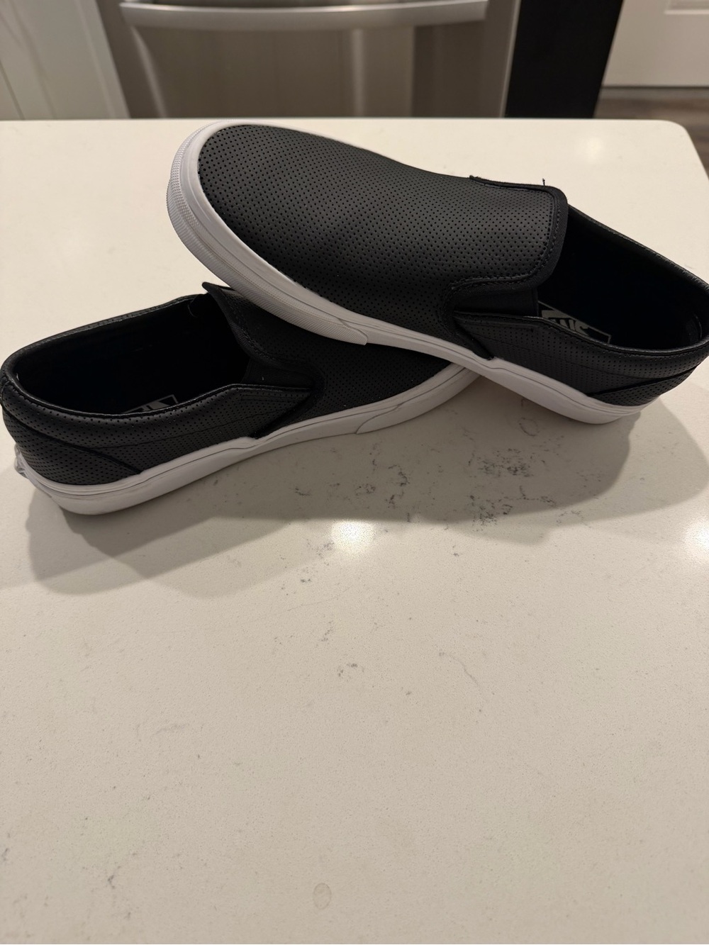 Vans Classic Black Leather Slip-On Sneakers